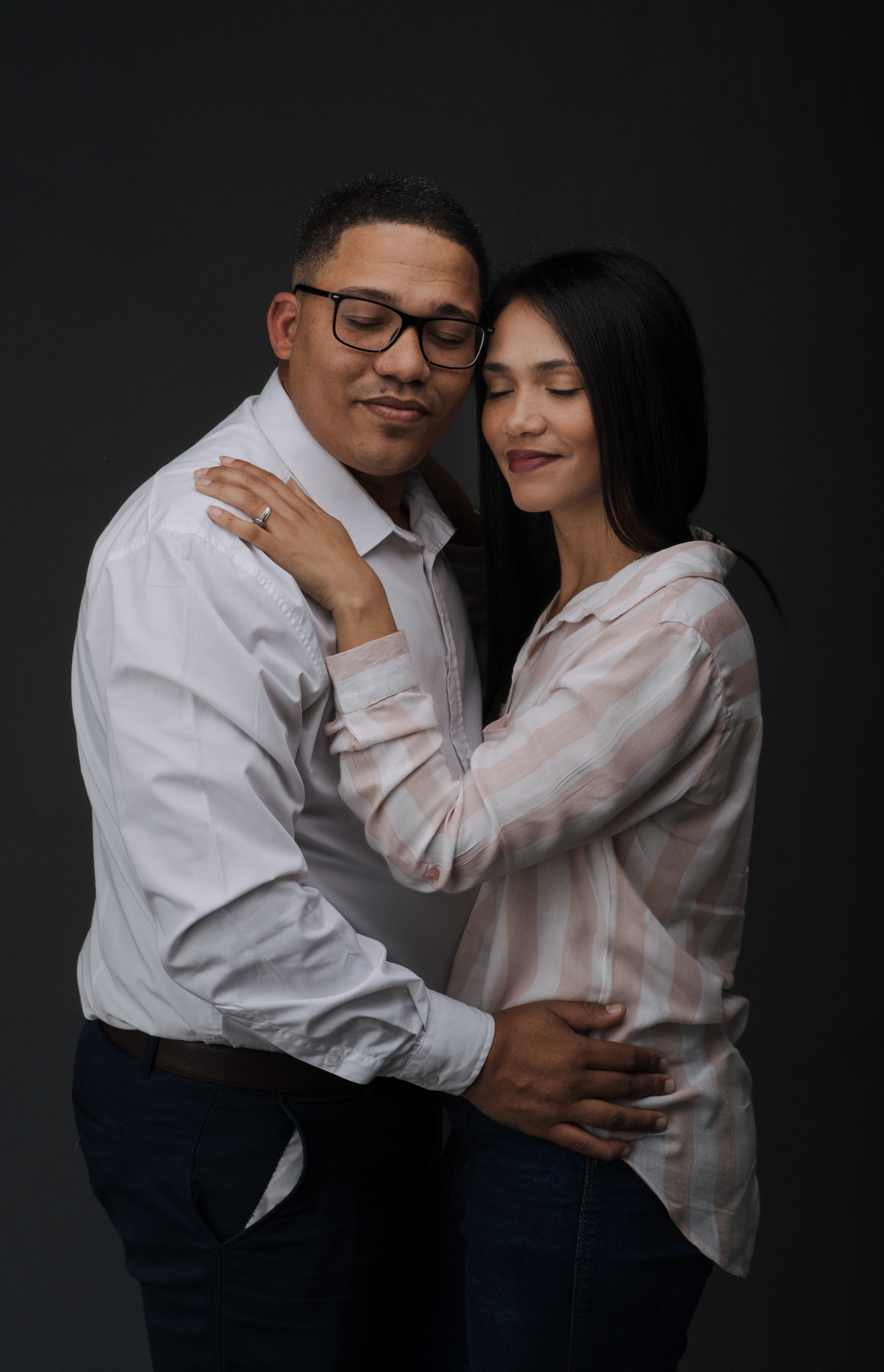 An intimate studio portrait of a couple