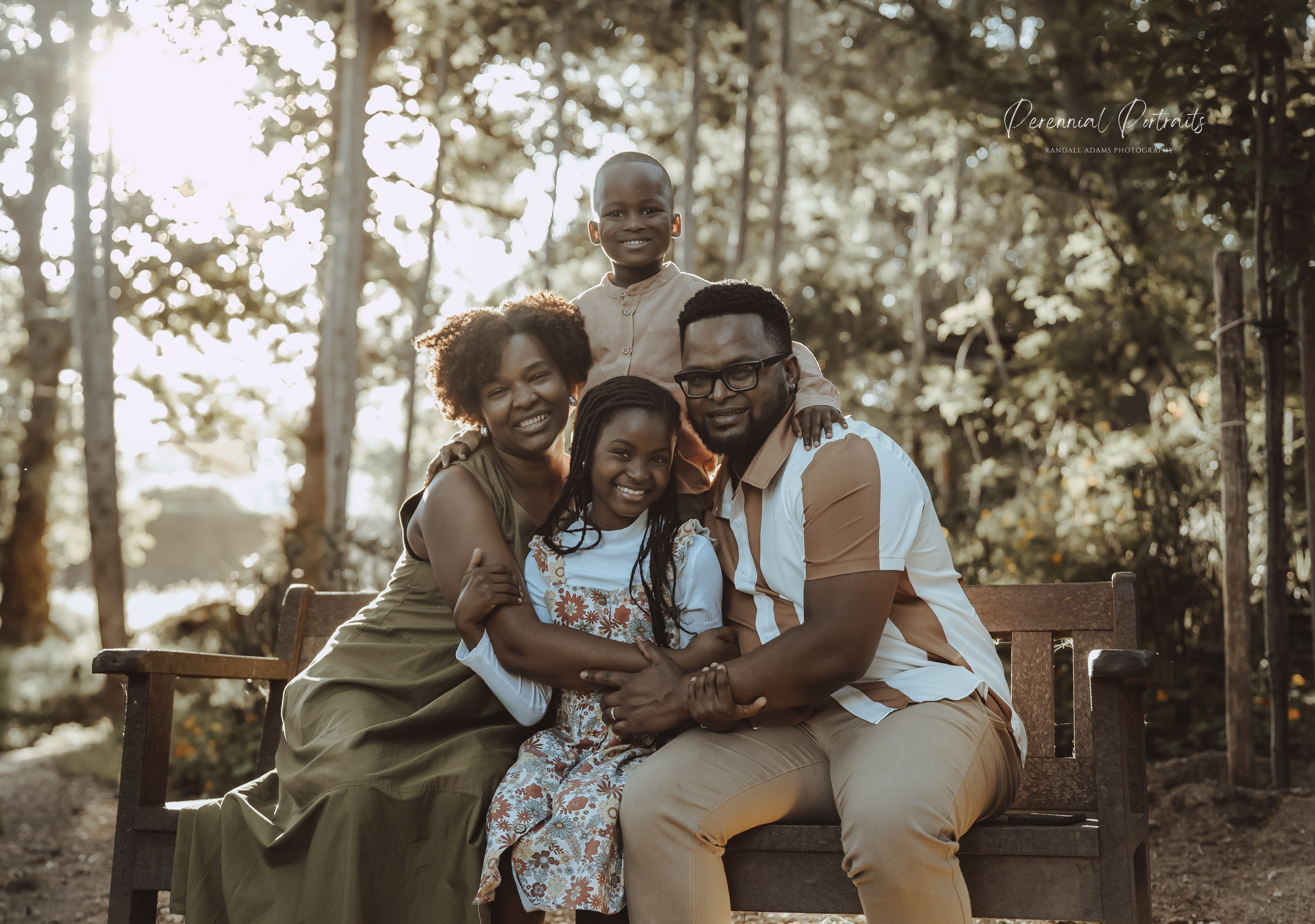 Family portrait together on a bench