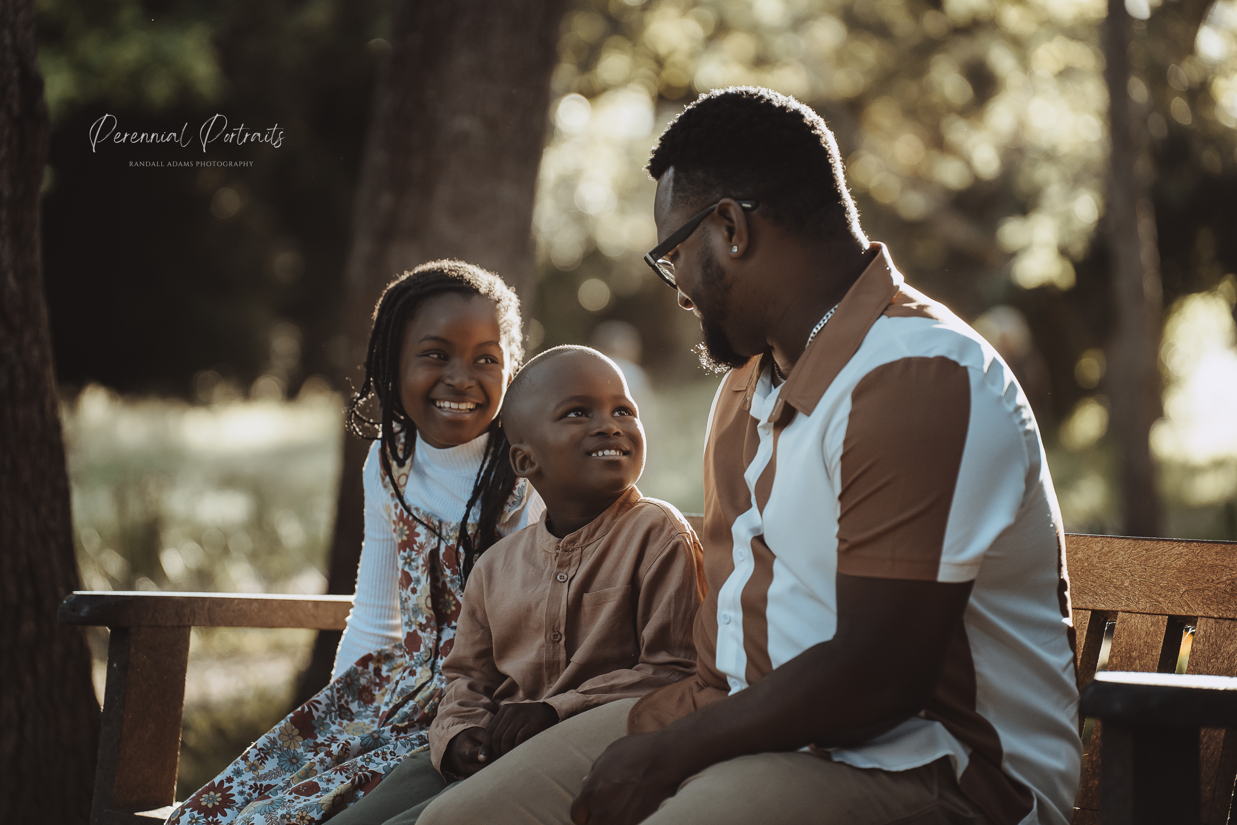 Family portrait outdoors among the trees