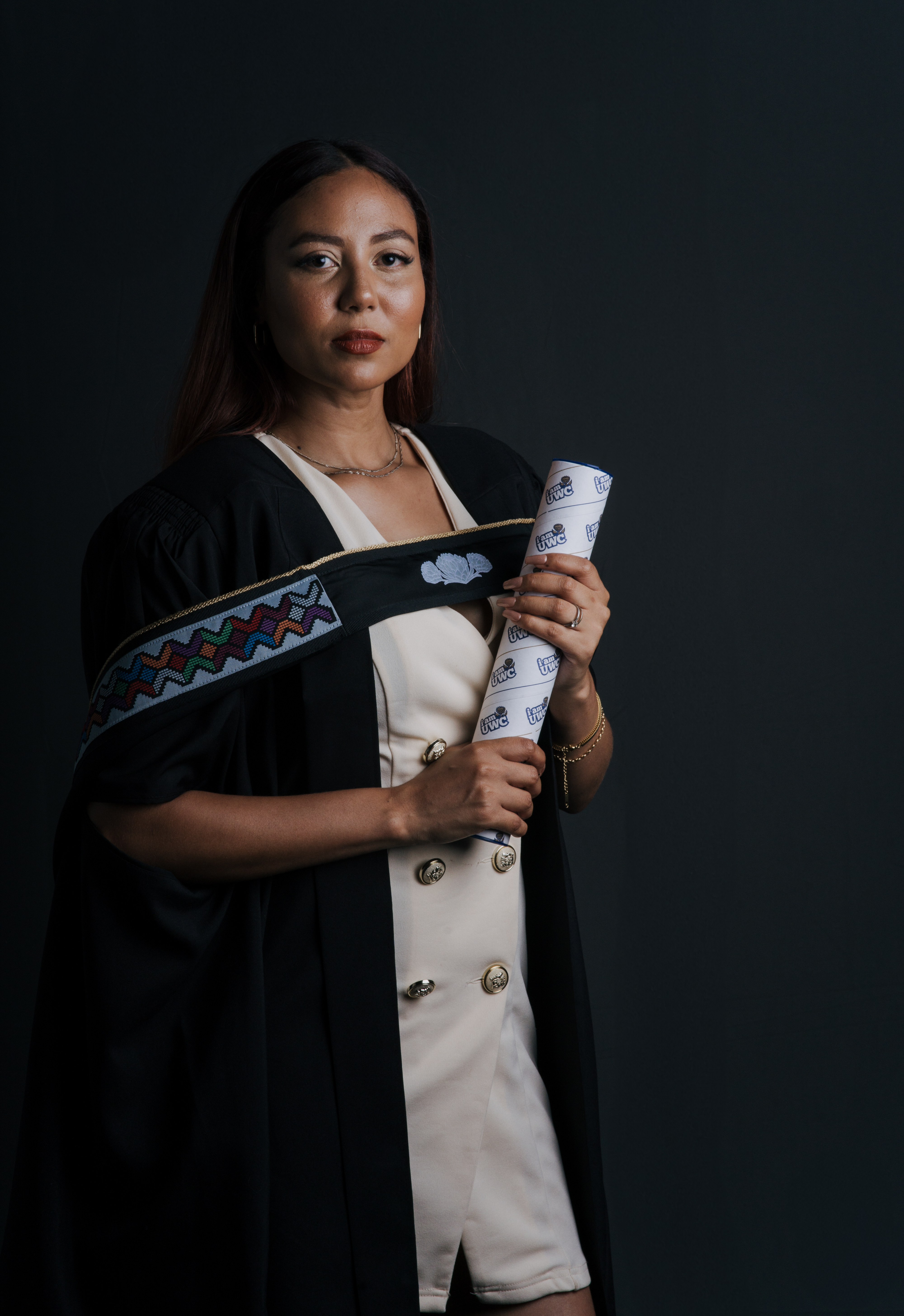 Graduation portrait with diploma