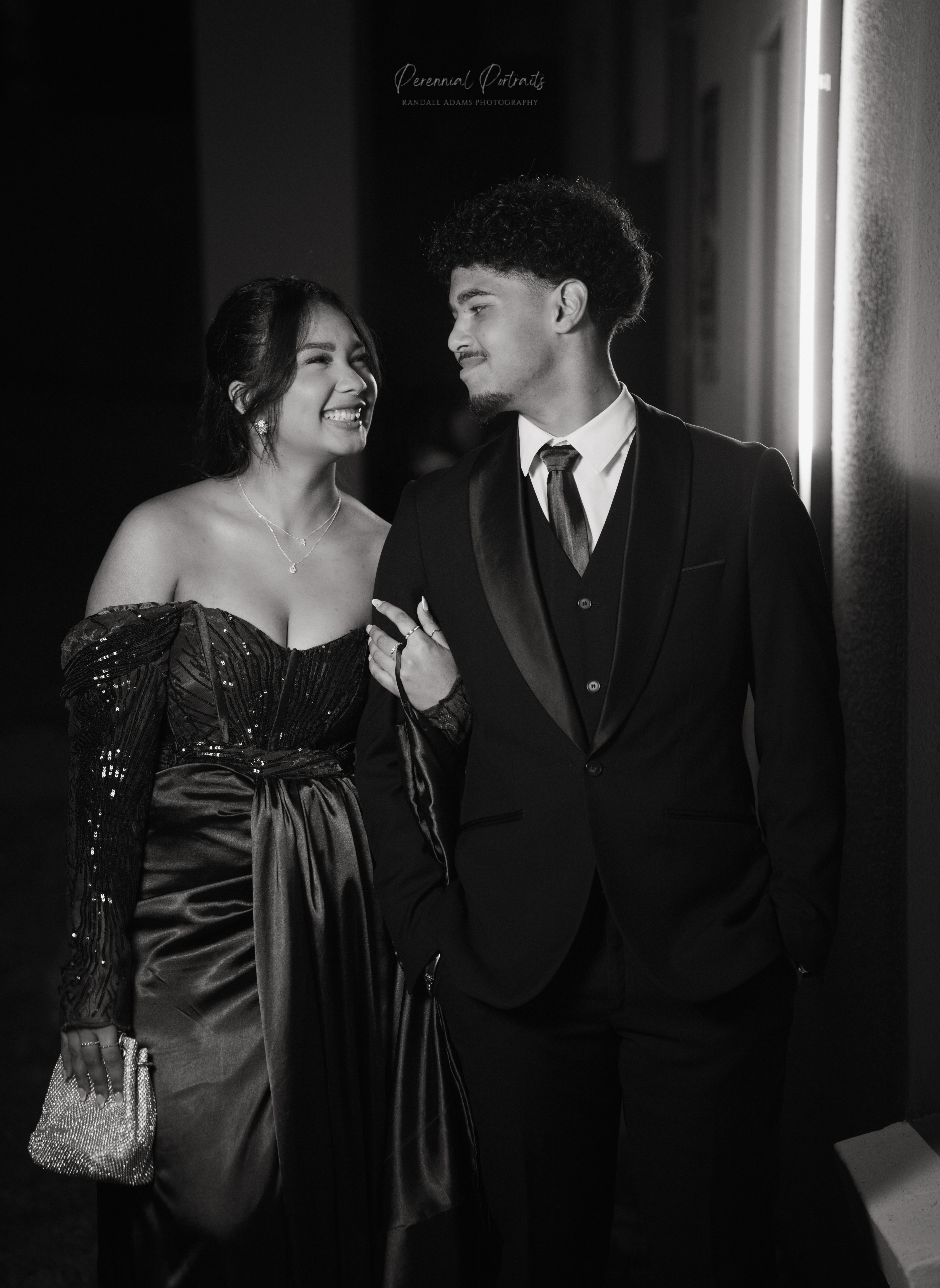 Couple laughing in black and white